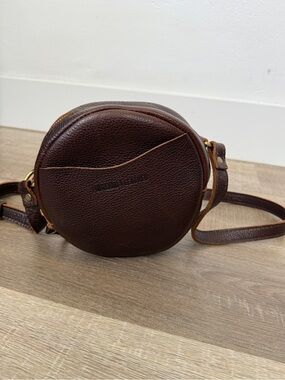 Portland Leather Almost Perfect Small Circle Pebbled Dark Brown Crossbody Bag